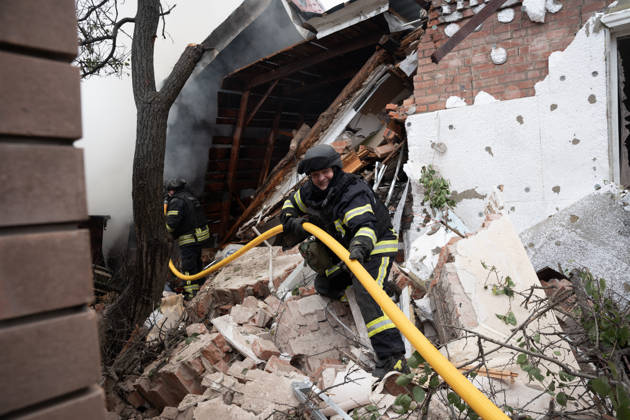 October 17, 2026, Sloviansk, Donetsk Oblast, Ukraine: Emergency services respond following a Russian attack on a residential neighbourhood in Sloviansk, Donetsk Oblast, Ukraine, as firefighters work to extinguish a blaze at a damaged house. Residents continue their daily lives amid the ongoing war. Sloviansk Ukraine - ZUMAm350 20261017_zip_m350_011 Copyright: xCameronxJones-Manleyx
