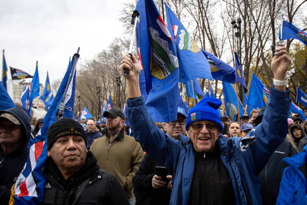 October 17, 2026, Edmonton, Ab, Canada: Attendees wave flags during an Alberta independence rally at the Alberta legislature, in Edmonton on Saturday, Oct. 17, 2026. Edmonton Canada  - ZUMAc35_ 20261017_zaf_c35_031 Copyright: xAmandaxMayxEricksonx