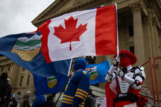 October 17, 2026, Edmonton, Ab, Canada: Canada Guy waves a Canadian flag during an Alberta independence rally at the Alberta legislature, in Edmonton on Saturday, Oct. 17, 2026. Edmonton Canada  - ZUMAc35_ 20261017_zaf_c35_033 Copyright: xAmandaxMayxEricksonx