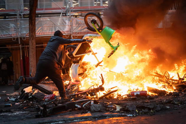 High Cost of Living Protest - Paris AJ Protesters throw an object in the flames during a demonstration to protest against the high cost of living , at Place de la Republique in Paris on October 17, 2026 as part of a nationwide call for mobilisation bringing together various groups expressing their anger: former Yellow Vest , secondary school and university students, climate activists and even farmers. After weeks of student protests, France faces broader, nationwide demonstrations on October 17, 2026 over the cost of living, setting up a potentially fraught six months heading into a presidential election. A police source told AFP that authorities estimated nearly 200,000 people could take part, with 40,000 in Paris. Photo by Alexis Jumeau  Copyright: xJumeauxAlexis ABACAx