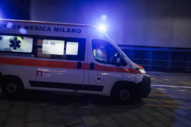 IPA89830556 - Milan: Damage caused by clashes between protesters and police during the Italia in Piazza demonstration against the high cost of living in the city center. Pictured: An ambulance on Missori Street Copyright: xAlessandroxBremecx xx IPA89830556