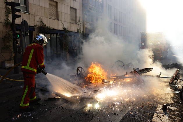 Aftermath of clashes during nationwide protests in Paris PARIS, FRANCE - OCTOBER 18: Firefighters extinguish fires set to bicycles and street debris as streets across Paris show signs of damage following a day of violent clashes between police and protesters amid a nationwide mobilization over rising living costs, fuel prices, and education funding in Paris, France, on October 18, 2026. Ibrahim Ezzat Anadolu Paris France. Editorial use only. Please get in touch for any other usage.  Copyright: x2026xAnadoluxIbrahimxEzzatx