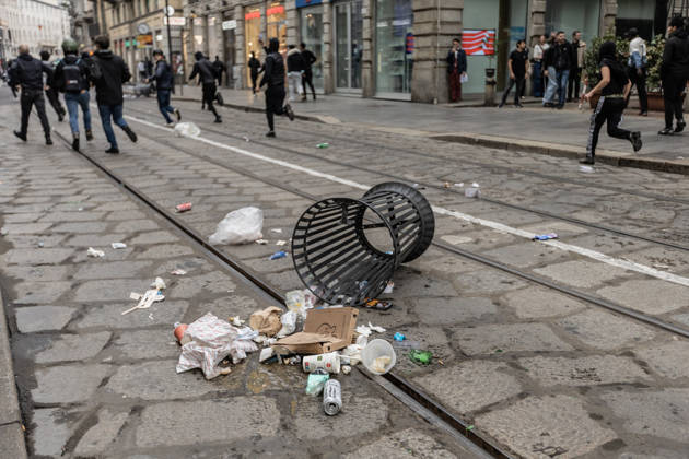 Police detain 160 as unrest continues for second day in Milan MILAN, ITALY - OCTOBER 18: An overturned trash bin is seen on a street following protests in Milan, Italy, on October 18, 2026. Groups threw stones, bottles, firecrackers and barriers at police officers, who responded with tear gas and water cannon, while shops were damaged and looted around the city center and a Carabinieri vehicle was destroyed. Andrea Carrubba Anadolu Milan Italy. Editorial use only. Please get in touch for any other usage.  Copyright: x2026xAnadoluxAndreaxCarrubbax