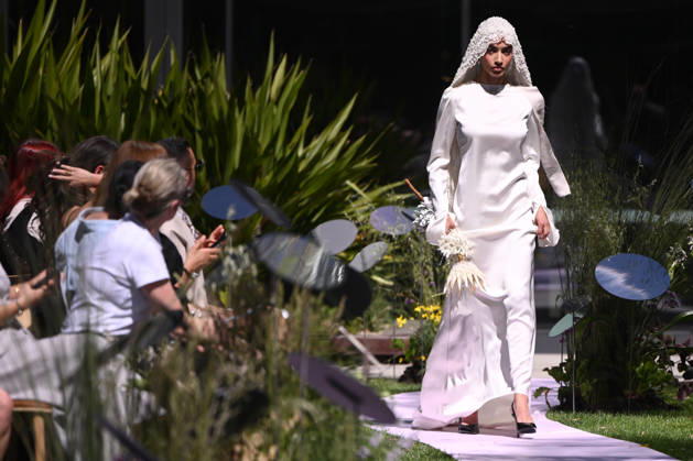 MELBOURNE FASHION WEEK PREVIEW, A model walks the runway during a 2026 Melbourne Fashion Week Runway Preview, at Sky Park, Melbourne, Monday, October 19, 2026. The preview features a selection of the upcoming collections that will appear on M FW runways including designers OUT OF HAND x Lisa Waup, Ebony Noire, Van Ermel Scherer, Perple, Gotham, Wilson Jedd Adams, Asiyam, Atoir, NGALI, Kuwaii, HoMie, Collective Closets x Mariam Farah, TOJHÃÄ, Amy Cottrell, BAAQIY and Sean Rentero. ( NO ARCHIVING MELBOURNE VICTORIA Australia Copyright: xJOELxCARRETTx 20261019131703415080
