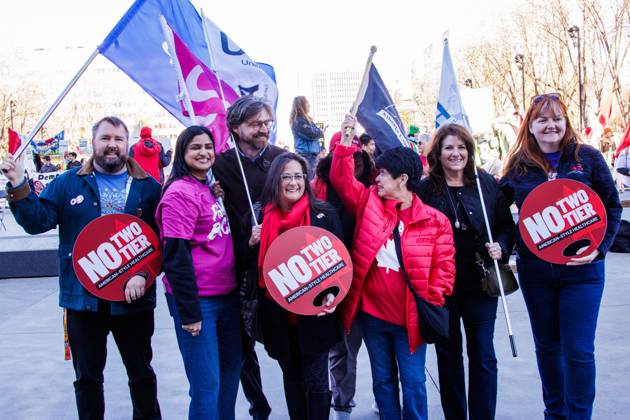 October 18, 2026, Edmonton, Alberta, Canada: Supporters display their signs at the Alberta Federation of Labour s Canada Unity Rally ahead of the Alberta Referendum..With less than 24 hours until Referendum voting starts, the Alberta Federation of Labour and Fight Back supporters rallied at the Alberta Legislature grounds to support a Unified Alberta in Canada and oppose the prospect of separation from Canada. The group is opposed to the 9 other questions on the Alberta referendum ballots. Edmonton Canada  - ZUMAs197 20261018_aaa_s197_631 Copyright: xRonxPalmerx