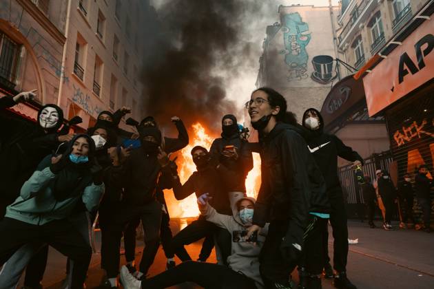 October 18, 2026, Paris, France: PARIS, FRANCE - OCTOBER 18, 2026: Protesters clash with police near Place de la RÃ publique in Paris during a protest against austerity. Protesters set up makeshift barricades and start fires in the square and surrounding streets. After police clear the square, protesters attack nearby shops. Paris France - ZUMAq101 20261018_zna_q101_292 Copyright: xOualidxAbdellaouix