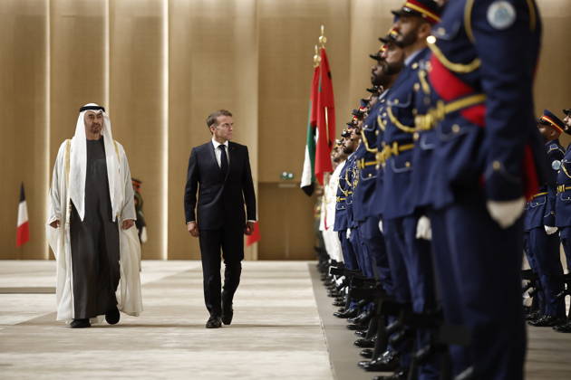 President Macron Visit To Middle East - Abu Dhabi Sheikh Mohamed bin Zayed Al Nahyan, President of the United Arab Emirates (UAE), and French President Emmanuel Macron review troops upon Macron s arrival at Zayed International Airport in Abu Dhabi, United Arab Emirates, October 19, 2026. Photo by Benoit Tessier Pool ABACAPRESS.COM Abu Dhabi United Arab Emirates  Copyright: xTessierxBenoit Pool ABACAx