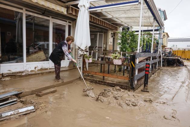 The Valencian Regional Government is preparing a lockdown order for the southern coast of Valencia and the northern coast of Alicante due to the rains. Several people are clearing mud from the streets while furniture they had to remove due to flooding caused by the heavy rains piles up, on October 19, 2026, in Els Poblets, Valencian Community, Spain. The Valencian Regional Government is preparing a lockdown order for the southern coast of Valencia and the northern coast of Alicante in response to the emergency declared due to the rains brought by Storm Adam, as announced by the Regional Minister of Emergencies and the Interior early this morning, October 19, from the Emergency Coordination Center (CCE) October 19, 2026, Valencia, Valencian Copyright: xRoberxSolsonax 7855649