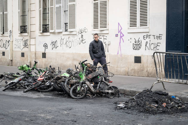 Shops Looted After the October 17th Demonstration - Paris AJ This photo shows a passerby looking at bicycles that have been charred, burned, and destroyed on October 19, 2026 two days after riots and looting occurred (pillage) on the sidelines of nationwide cost-of-living demonstrations. Photo by Alexis Jumeau ABACAPRESS.COM Paris France  Copyright: xJumeauxAlexis ABACAx