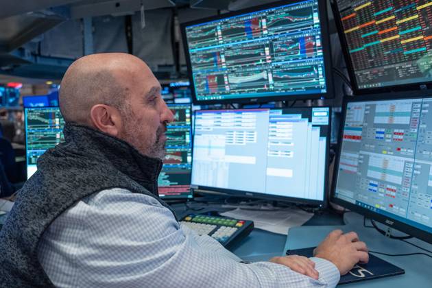 October 19, 2026, New York, New York, USA: A trader works on the trading floor of the New York Stock Exchange (NYSE) during opening hours in New York, NY on October 19, 2026. New York USA  - ZUMAr339 20261019_znp_r339_004 Copyright: xLevxRadinx