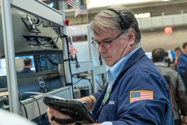 October 19, 2026, New York, New York, USA: A trader works on the trading floor of the New York Stock Exchange (NYSE) during opening hours in New York, NY on October 19, 2026. New York USA - ZUMAr339 20261019_znp_r339_010 Copyright: xLevxRadinx