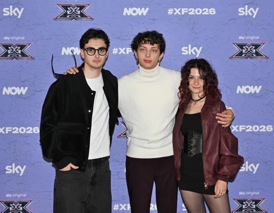 IPA89927950 - Milan, Italy: X Factor 2026 photocall featuring the 12 official contestants IRAMA S TEAM In the photo: Le Distanze (Andrea Manuel Pagella, Saverio Campese, Corinna Lanari)  Copyright: xNickxZonnax xNickxZonnax IPA89927950