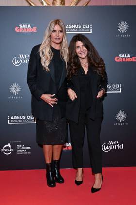 IPA89934752 - Rome: Allegrio Roma. Charity Event for WeWorld. Pictured: Tiziana Rocca and a guest  Copyright: xMaurizioxD Avanzox xDxAvanzo Provvisionato Landix IPA89934752