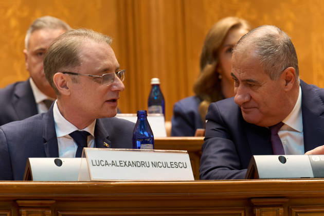 Luca Niculescu New Romanian Prime Minister Vote in Paliament Bucharest, Romania. 20th Oct, 2026: Luca Niculescu (L), prime minister‘designate, speaks with Marian Neacsu (R) during the vote on his cabinet in the Romanian Parliament. Bucharest Romania Copyright: xLucianxAlecux