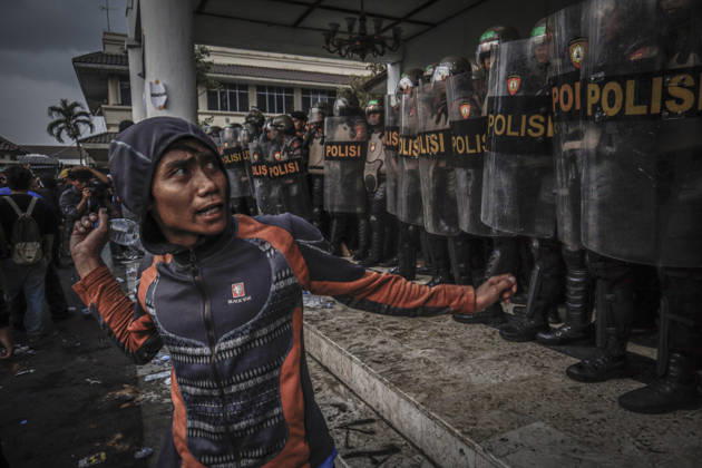 October 20, 2026, Yogyakarta, Special Region Of Yogyakarta, Indonesia: Special Region of Yogyakarta, October 20, 2026. A crowd comprising members of a community and student alliance staged a protest in front of the Special Region of Yogyakarta Regional PeopleÃ¢â‚¬â ¢s Representative Council (DPRD) building. During the protest, the demonstrators made several demands, including that forest and land fires and floods be declared national disasters; that strict action be taken against the corporations involved; and that the cost of education and healthcare be reduced and access to these services be made more equitable. Yogyakarta Indonesia  - ZUMAf198 20261020_zip_f198_005 Copyright: xMuhammadxFebriansyahx