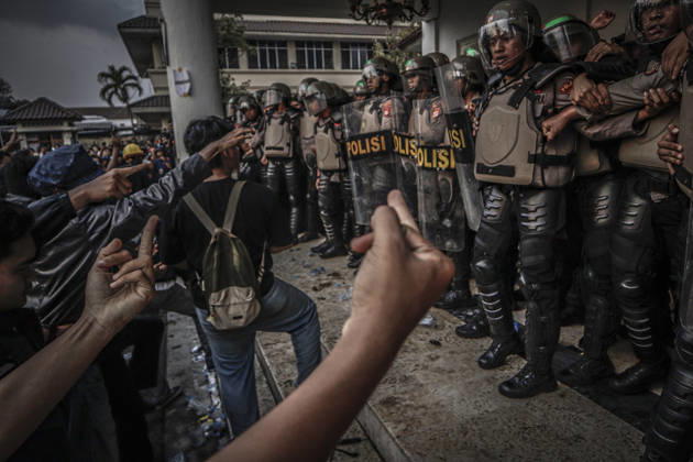 October 20, 2026, Yogyakarta, Special Region Of Yogyakarta, Indonesia: Special Region of Yogyakarta, October 20, 2026. A crowd comprising members of a community and student alliance staged a protest in front of the Special Region of Yogyakarta Regional People™s Representative Council (DPRD) building. During the protest, the demonstrators made several demands, including that forest and land fires and floods be declared national disasters; that strict action be taken against the corporations involved; and that the cost of education and healthcare be reduced and access to these services be made more equitable. Yogyakarta Indonesia - ZUMAf198 20261020_zip_f198_017 Copyright: xMuhammadxFebriansyahx