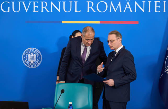 Bucharest, Romania. 20th Oct, 2026: Luca Niculescu (R), Prime Minister of Romania, speaks with Marian Neacsu (L), Deputy Prime Minister and Minister of Internal Affairs, during the government meeting at Victoria Palace, the Romanian Government headquarters. Bucharest Romania Copyright: xLucianxAlecux