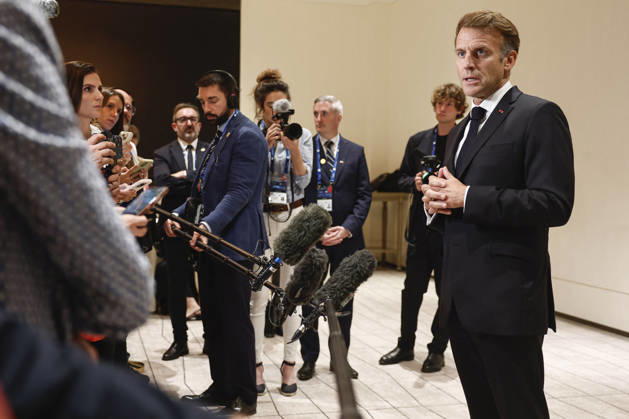 President Macron At The Opswf Summit During His Visit To Qatar French President Emmanuel Macron speaks to members of the media on the day of the 9th Annual One Planet Sovereign Wealth Funds (OPSWF) Summit, in Lusail, Qatar, October 21, 2026. Photo by Benoit Tessier Pool ABACAPRESS.COM Lusail Qatar  Copyright: xTessierxBenoit Pool ABACAx
