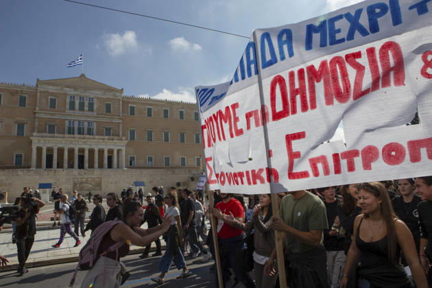 Athens Greece Living Costs Protest Protesters carry a banner reading Public Education Until the End during a rally in Athens, Greece on October 21, 2026. Students and other demonstrators marched through central Athens to protest rising living costs and economic pressures. Organizers say the concerns raised by participants echo grievances voiced during recent demonstrations in France. Athens Attica Greece Copyright: xElvisxTakahashixMantellox
