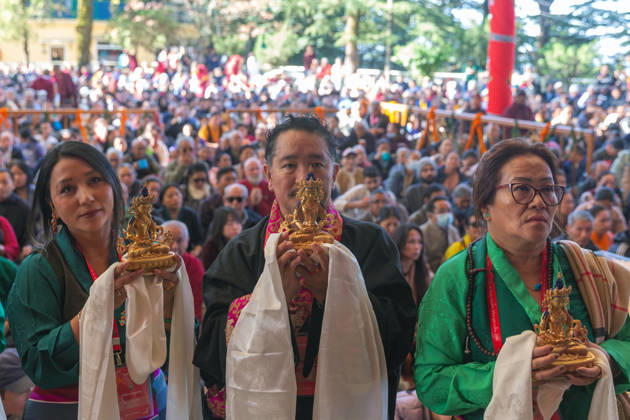 October 21, 2026, Dharamshala, Himachal Pradesh, India: Exiled Tibetan standing in a queue with ceremonial offerings for Tibetan Spiritual leader the Dalai Lama during a Long Life Prayer offered to him by TIPA, Norbulingka Institute and Nepal Tibetan Lhamo Association at Tsuglakhang Temple, Mcleodganj, Dharamshala on Wednesday. Dharamshala India  - ZUMAb235 20261021_zip_b235_009 Copyright: xShaileshxBhatnagarx