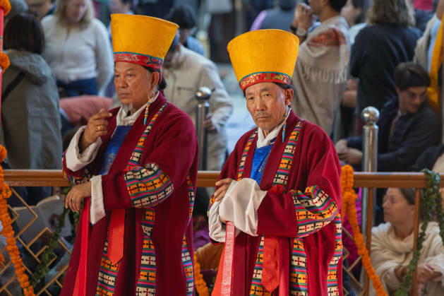 October 21, 2026, Dharamshala, Himachal Pradesh, India: Exiled Tibetans in ceremonial costumes wait to welcome Tibetan Spiritual leader the Dalai Lama during a Long Life Prayer offered to him by TIPA, Norbulingka Institute and Nepal Tibetan Lhamo Association at Tsuglakhang Temple, Mcleodganj, Dharamshala on Wednesday. Dharamshala India  - ZUMAb235 20261021_zip_b235_014 Copyright: xShaileshxBhatnagarx