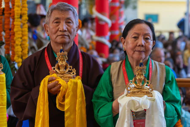 October 21, 2026, Dharamshala, Himachal Pradesh, India: Exiled Tibetans standing in a queue with ceremonial offerings for Tibetan Spiritual leader the Dalai Lama during a Long Life Prayer offered to him by TIPA, Norbulingka Institute and Nepal Tibetan Lhamo Association at Tsuglakhang Temple, Mcleodganj, Dharamshala on Wednesday. Dharamshala India - ZUMAb235 20261021_zip_b235_040 Copyright: xShaileshxBhatnagarx