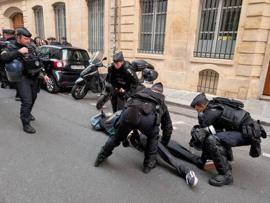 Students stage sit-in protest at Sciences Po Paris PARIS, FRANCE - OCTOBER 22: French gendarmerie officers intervene as students stage a sit-in protest outside Sciences Po Paris in Paris, France, on October 22, 2026. Students remain seated on the sidewalk as officers approach and attempt to remove protesters from the area. Luc Auffret Anadolu Paris France. Editorial use only. Please get in touch for any other usage.  Copyright: x2026xAnadoluxLucxAuffretx