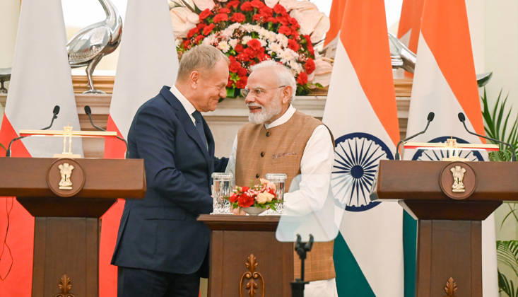 NEW DELHI, INDIA - OCTOBER 22: Prime Minister Narendra Modi (R) speaks with Prime Minister of Poland Donald Tusk (L) during a joint press statement following delegation-level bilateral talks at Hyderabad House on October 22, 2026 in New Delhi, India. The high-level meeting marked Polish Prime Minister Tusk s official visit to India from October 21-23, 2026 his first visit to the country as Prime Minister since 2010 aimed at advancing the India-Poland Strategic Partnership and deepening India-EU strategic ties. During wide-ranging discussions, both leaders reviewed bilateral cooperation across key sectors including trade, technology, defense-industrial collaboration, and energy, while reaffirming joint commitment toward peaceful diplomatic s