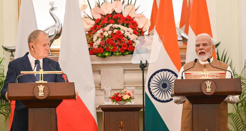 NEW DELHI, INDIA - OCTOBER 22: Prime Minister Narendra Modi (R) and Prime Minister of Poland Donald Tusk (L) address a joint press statement following delegation-level bilateral talks at Hyderabad House on October 22, 2026 in New Delhi, India. The high-level meeting marked Polish Prime Minister Tusk s official visit to India from October 21-23, 2026 his first visit to the country as Prime Minister since 2010 aimed at advancing the India-Poland Strategic Partnership and deepening India-EU strategic ties. During wide-ranging discussions, both leaders reviewed bilateral cooperation across key sectors including trade, technology, defense-industrial collaboration, and energy, while reaffirming joint commitment toward peaceful diplomatic solution