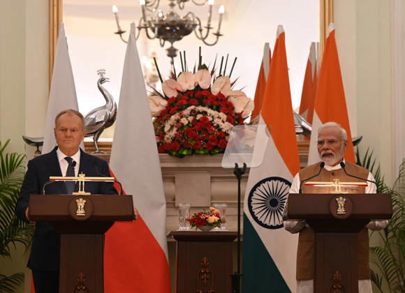 NEW DELHI, INDIA - OCTOBER 22: Prime Minister Narendra Modi (R) and Prime Minister of Poland Donald Tusk (L) address a joint press statement following delegation-level bilateral talks at Hyderabad House on October 22, 2026 in New Delhi, India. The high-level meeting marked Polish Prime Minister Tusk s official visit to India from October 21-23, 2026 his first visit to the country as Prime Minister since 2010 aimed at advancing the India-Poland Strategic Partnership and deepening India-EU strategic ties. During wide-ranging discussions, both leaders reviewed bilateral cooperation across key sectors including trade, technology, defense-industrial collaboration, and energy, while reaffirming joint commitment toward peaceful diplomatic solution