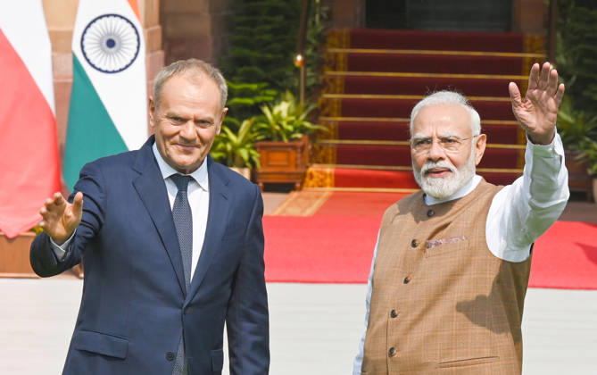 NEW DELHI, INDIA - OCTOBER 22: Prime Minister Narendra Modi (R) poses for a photograph with the Prime Minister of Poland, Donald Tusk (L), prior to their delegation-level bilateral meeting and joint press statement at Hyderabad House on October 22, 2026 in New Delhi, India. The high-level meeting marked Polish Prime Minister Tusk s official visit to India from October 21-23, 2026 his first visit to the country as Prime Minister since 2010 aimed at advancing the India-Poland Strategic Partnership and deepening India-EU strategic ties. During wide-ranging discussions, both leaders reviewed bilateral cooperation across key sectors including trade, technology, defense-industrial collaboration, and energy, while reaffirming joint commitment towa