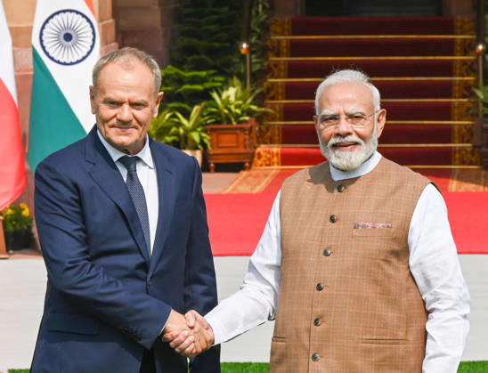 NEW DELHI, INDIA - OCTOBER 22: Prime Minister Narendra Modi (R) poses for a photograph with the Prime Minister of Poland, Donald Tusk (L), prior to their delegation-level bilateral meeting and joint press statement at Hyderabad House on October 22, 2026 in New Delhi, India. The high-level meeting marked Polish Prime Minister Tusk s official visit to India from October 21-23, 2026 his first visit to the country as Prime Minister since 2010 aimed at advancing the India-Poland Strategic Partnership and deepening India-EU strategic ties. During wide-ranging discussions, both leaders reviewed bilateral cooperation across key sectors including trade, technology, defense-industrial collaboration, and energy, while reaffirming joint commitment towa