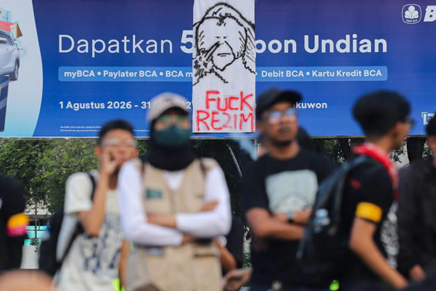 October 22, 2026, Surabaya, East Java, Indonesia: Demonstrators hold up posters during a protest in front of the Gedung Negara Grahadi in Surabaya, East Java, Indonesia, on October 22, 2026. The students demand accountability from the central and regional governments, alleging that both have failed to fulfill their political promises. Their demands include upholding civil supremacy, ending military involvement in the civil sphere, canceling the Free Nutritious Meal (MBG) program and the Red and White Village Cooperatives, and restoring the 20 percent education budget allocation as mandated by the constitution. They also request that forest and land fires (karhutla) be designated a national disaster. The protesters call for Prabowo Subianto - ZUMAp290 20261022_zip_p290_009 Copyright: xRendyxAgungxPrakosox