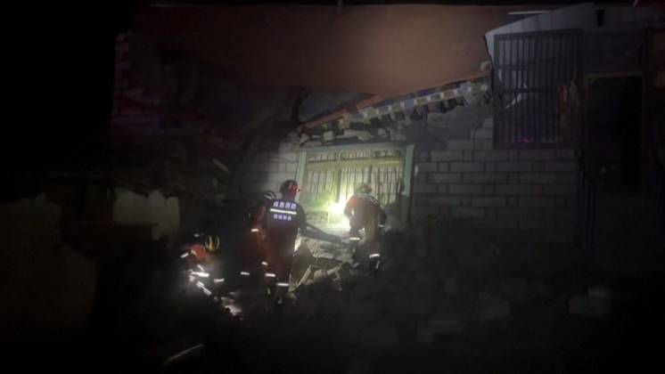 NAGQU, CHINA - OCTOBER 23: This screen grab made from the CCTV+ footage released on October 23, 2026 shows rescuers searching through ruins with flashlight after a 7.0-magnitude earthquake on October 23, 2026 in Nagqu, Xizang Autonomous Region of China. At least 16 people have been killed and 11 seriously injured as of 05:20 on Friday after a 7.0-magnitude earthquake hit southwest China s Xizang Autonomous Region on Thursday night, according to Nagqu City s earthquake relief headquarters.  Copyright: xVCGx 111676447828