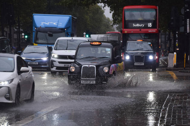 October 23, 2026, London, England, United Kingdom: Taxis and cars pass through a waterlogged Euston Road as Storm Austen brings rain to the capital. London United Kingdom - ZUMAv130 20261023_zip_v130_010 Copyright: xVukxValcicx