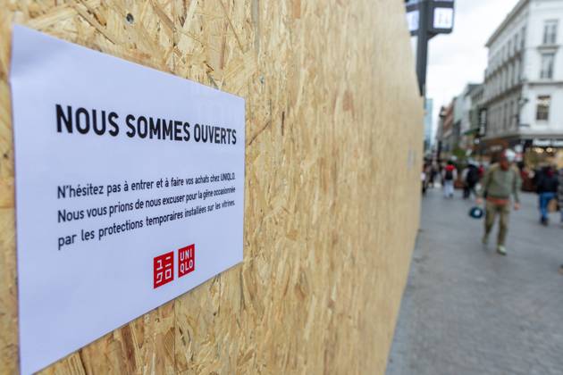 Storefronts boarded up with wooden panels at Rue Neuve Nieuwstraat, in Brussels, on Friday 23 October 2026. Stores are preparing for another protest scheduled for Saturday.  NICOLASxMAETERLINCK 190739545