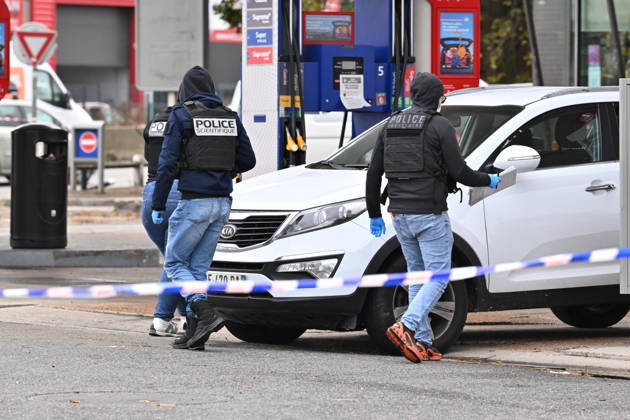 Forensics investigate scene of deadly petrol station drive-by shooting in Paris suburb of Trappes TRAPPES, FRANCE - OCTOBER 23: Forensic officers examine evidence at the site of a petrol station where a gunman opened fire from a vehicle, killing one person and injuring four others, in Trappes, a suburb west of Paris in the Yvelines department, France, on Friday, October 23, 2026. Mayor of Trappes Ali Rabeh confirmed on social media that a gunman fired shots from his car at several individuals across Trappes and nearby La Verriere, while the Yvelines Prefecture and emergency services secured the perimeter as law enforcement apprehended a suspect. Mustafa Yalcin Anadolu Trappes France. Editorial use only. Please get in touch for any other u  Copyright: x2026xAnadoluxMustafaxYalcinx