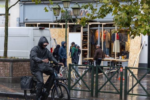 Storefronts boarded up with wooden panels, in Brussels, on Friday 23 October 2026. Stores are preparing for another protest scheduled for Saturday.  NICOLASxMAETERLINCK 190744657