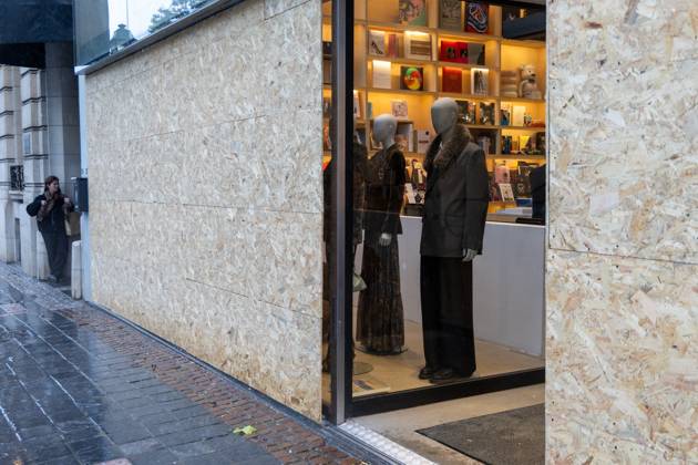 Storefronts boarded up with wooden panels, in Brussels, on Friday 23 October 2026. Stores are preparing for another protest scheduled for Saturday.  NICOLASxMAETERLINCK 190744600