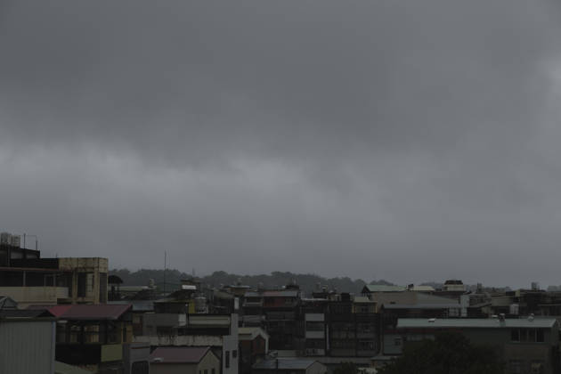 October 24, 2026, Taichung, Taiwan: Dark clouds over buildings as the rain persists on the outskirts of Taichung, Taiwan. The land warning for Typhoon Champi is expected to be lifted Saturday evening and the sea warning later at night, as the storm moves away from Taiwan, the Central Weather Administration (CWA) said. Taichung Taiwan - ZUMAc217 20261024_zip_c217_002 Copyright: xAndrexM.xChangx
