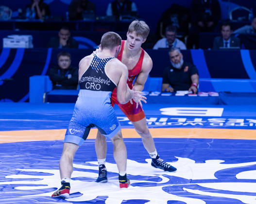 October 24, 2026, Astana, 2021 World Wrestling Championshi, Kazakhstan: Finland s Jonni Kunnari Sarkkinen (red) competes against Croatia s Antonio Kamenjasevic (blue) in the men s Greco-Roman 77kg competition at the Senior World Wrestling Championships in Astana, Kazakhstan, on October 24, 2026. Sarkkinen won the bout 7-2. . Astana Kazakhstan - ZUMAt172 20261024_zip_t172_007 Copyright: xJosexTabaresx