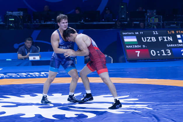 October 24, 2026, Astana, 2021 World Wrestling Championshi, Kazakhstan: Uzbekistan s Doniyorkhon Nakibov (red) competes against Finland s Jonni Kunnari Sarkkinen (blue) in the men s Greco-Roman 77kg competition at the Senior World Wrestling Championships in Astana, Kazakhstan, on October 24, 2026. Nakibov won the bout 7-2. . Astana Kazakhstan - ZUMAt172 20261024_zip_t172_003 Copyright: xJosexTabaresx