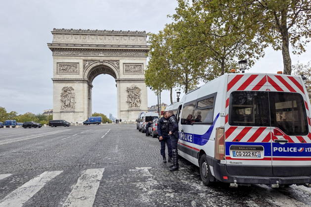 FRANCE, PARIS - OCTOBER 24, 2026: The police are seen near the Arc de Triomphe. Security measures have been tightened in the French capital as mass protests involving trade unions and university students are expected. Dmitry Orlov TASS  99860470