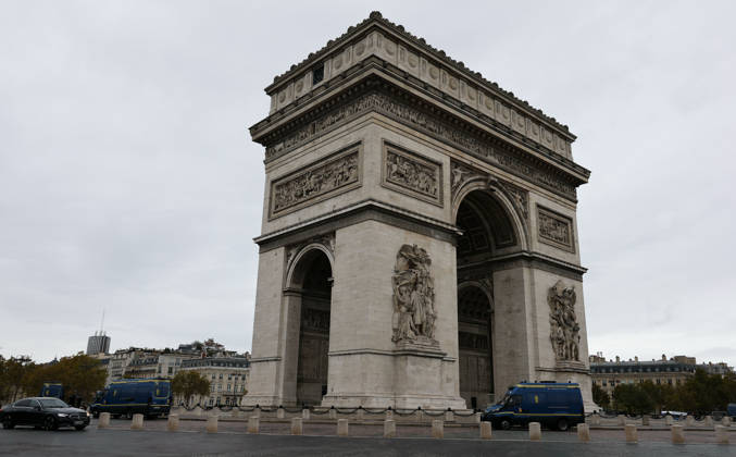 (261024) -- PARIS, Oct. 24, 2026 -- Security vehicles are seen near the Arc de Triomphe in Paris, France, Oct. 24, 2026. French Interior Minister Laurent Nunez said Tuesday that the government would deploy soldiers from the French army s Operation Sentinelle to help prevent violence during the demonstrations announced for Oct. 24. ) FRANCE-PARIS-PROTEST-SECURITY WuxHuiwo 