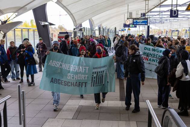 October 24, 2026, Schkeuditz, Saxony, Germany: SCHKEUDITZ, GERMANY OCTOBER 24, 2026: Demonstrators take part in a protest against deportations at Leipzig Halle Airport as part of a nationwide day of action against deportations and deportation detention. The protest focuses particularly on charter deportation flights to Afghanistan. Schkeuditz Germany - ZUMAq101 20261024_zna_q101_023 Copyright: xMariaxCastrox