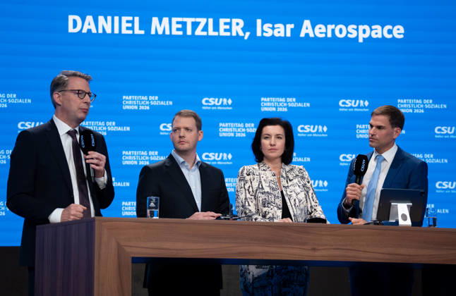 Tag 2, Parteitag 2026 der Partei CSU (Christlich-Soziale-Union) in der Messe München. Markus Blume (MdL), Daniel Metzler (Mitgründer und CEO des deutschen Raumfahrt-Start-ups Isar Aerospace), Dorothee Bär (MdB, Bundesministerin für Forschung, Technolog