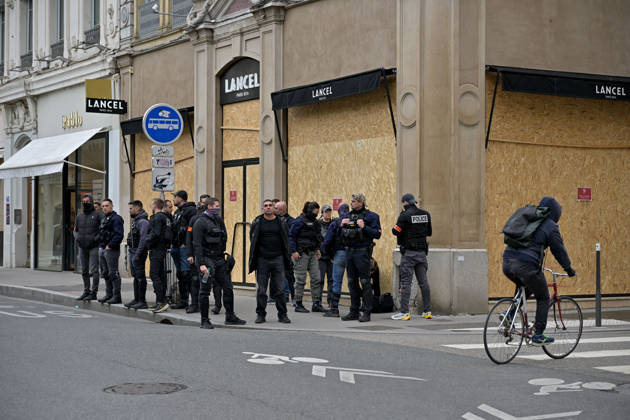Shops Boarded Up With Wooden Panels - Lyon Police protection while shops in Lyon are boarded up with wooden panels ahead the Yellow Vests Protest Act II In Lyon, France on October 24, 2026. Photo by ABACAPRESS.COM Lyon France  Copyright: xABACAx