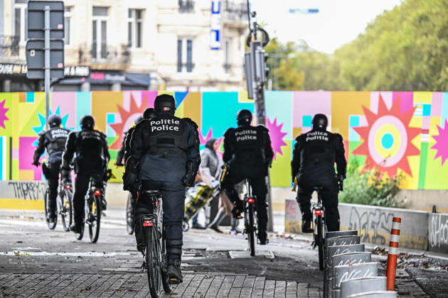 Riot police officers on bicycles take action during student protests in central Brussels, Belgium, on 24 October 2026. Police units are deployed throughout the city centre as officers repeatedly intervene to disperse groups of demonstrators between Avenue Lemonnier and Brussels-South railway station.