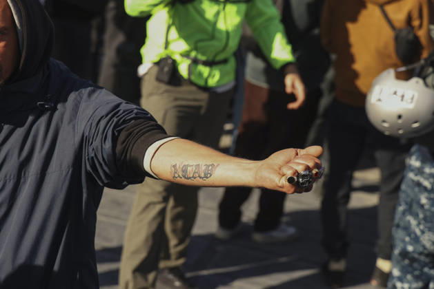 Brussels Belgium Education Protest A demonstrator extends an arm showing a forearm tattoo during a demonstration in Brussels, Belgium on October 24, 2026. Hundreds of mainly young protesters gathered in Brussels to demand more funding for education and public services. Demonstrators further criticized police conduct, accusing officers of excessive force during previous rallies. Brussels Brussels Capital Belgium Copyright: xMohammedxHamadax