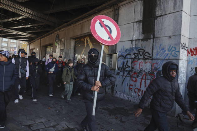 Brussels Belgium Education Protest A demonstrator carries a street sign during a protest march in Brussels, Belgium on October 24, 2026. Hundreds of mainly young protesters gathered in Brussels to demand more funding for education and public services. Demonstrators further criticized police conduct, accusing officers of excessive force during previous rallies. Brussels Brussels Capital Belgium Copyright: xMohammedxHamadax